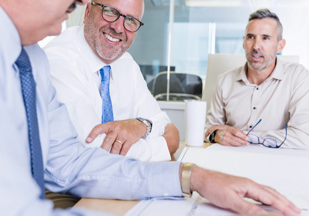 Cordia employees talking in a conference room